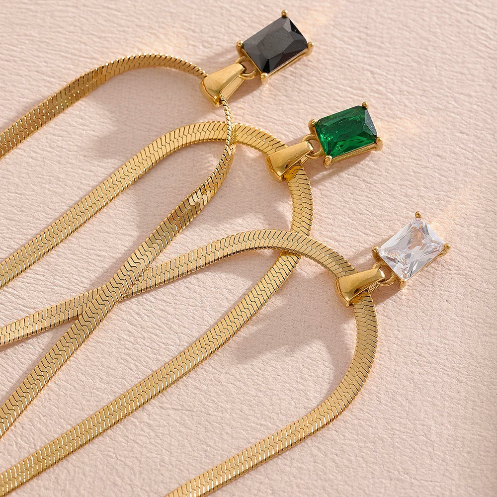 Nova Glow - Gold Flat Snake Necklace with Green Crystal