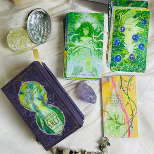 The Whisper of Stars and Garden Tarot card artwork and packaging