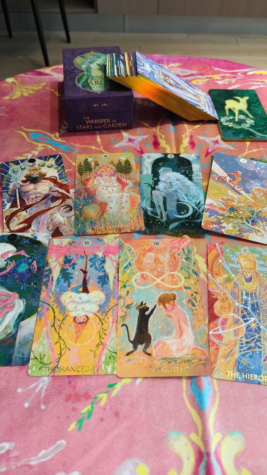 The Whisper of Stars and Garden Tarot card artwork and packaging